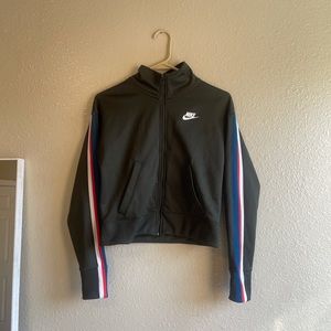 Brand new army green Nike track jacket with striped sides